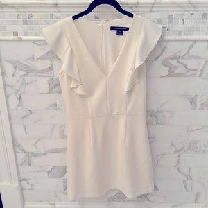 French Connection whisper ruffle v-neck dress in cream color. Size 6